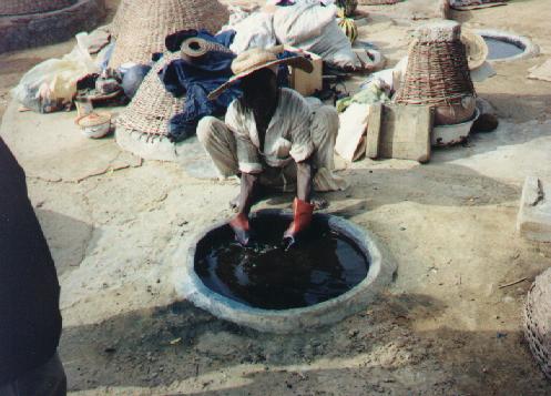 working the dye into the cloth